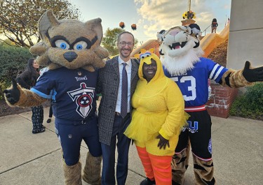 people in costumes at Spooktacular event