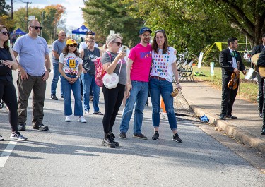 group of people including Mayor Freddie O'Connell standing in a street