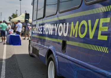 WeGo bus with Choose How You Move logo