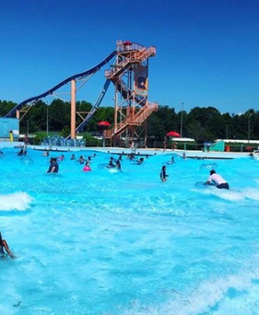 pool at Wave Country with water slide in background