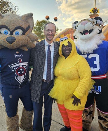 people in costumes at Spooktacular event